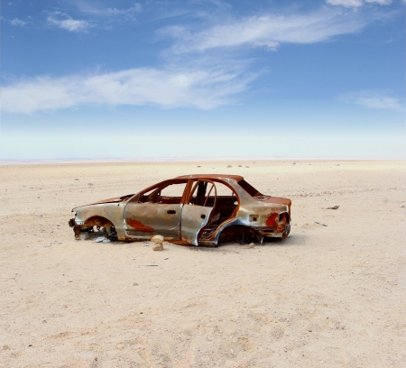 Abandoned car in the desert.